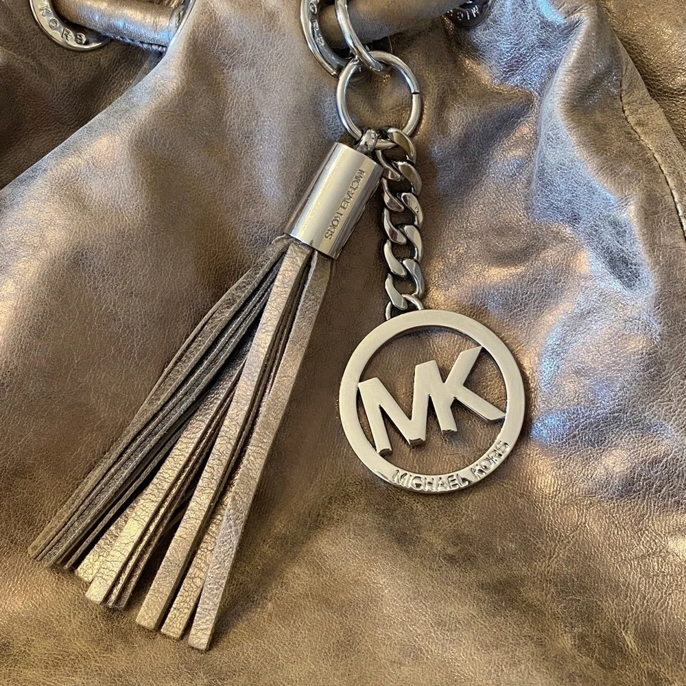 Michael Kors East West Ring Bag in a metallic, distressed leather